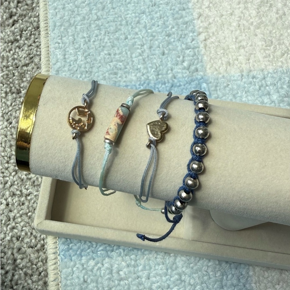 Set of Four Blue String Charm Bracelets